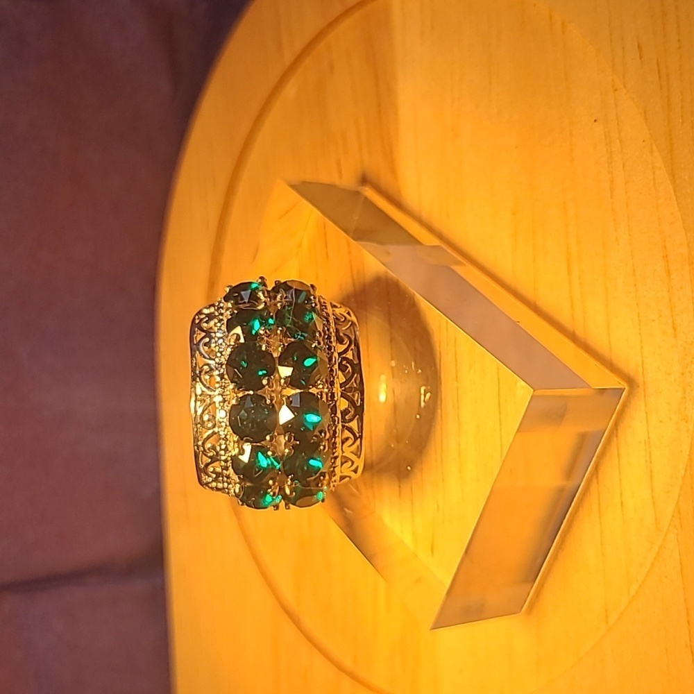 Vintage cocktail ring size five with Faux green stones and silver color